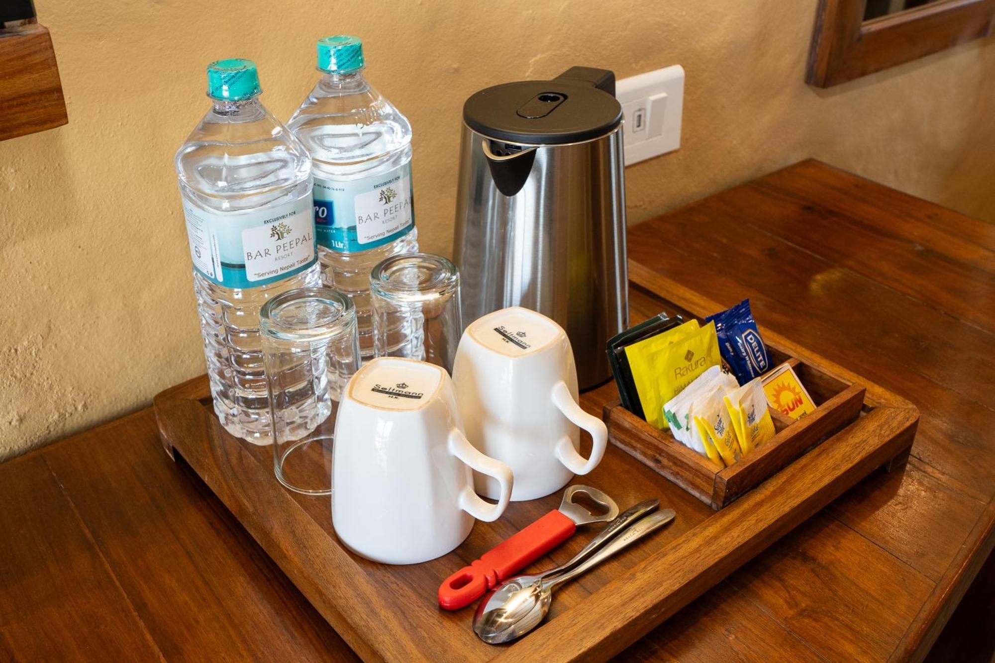 Bar Peepal Resort Pokhara Exterior foto A tea tray